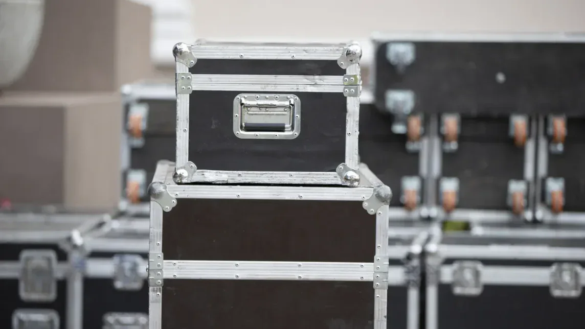 Stacked flight cases in secure film production storage between shoots in Londo